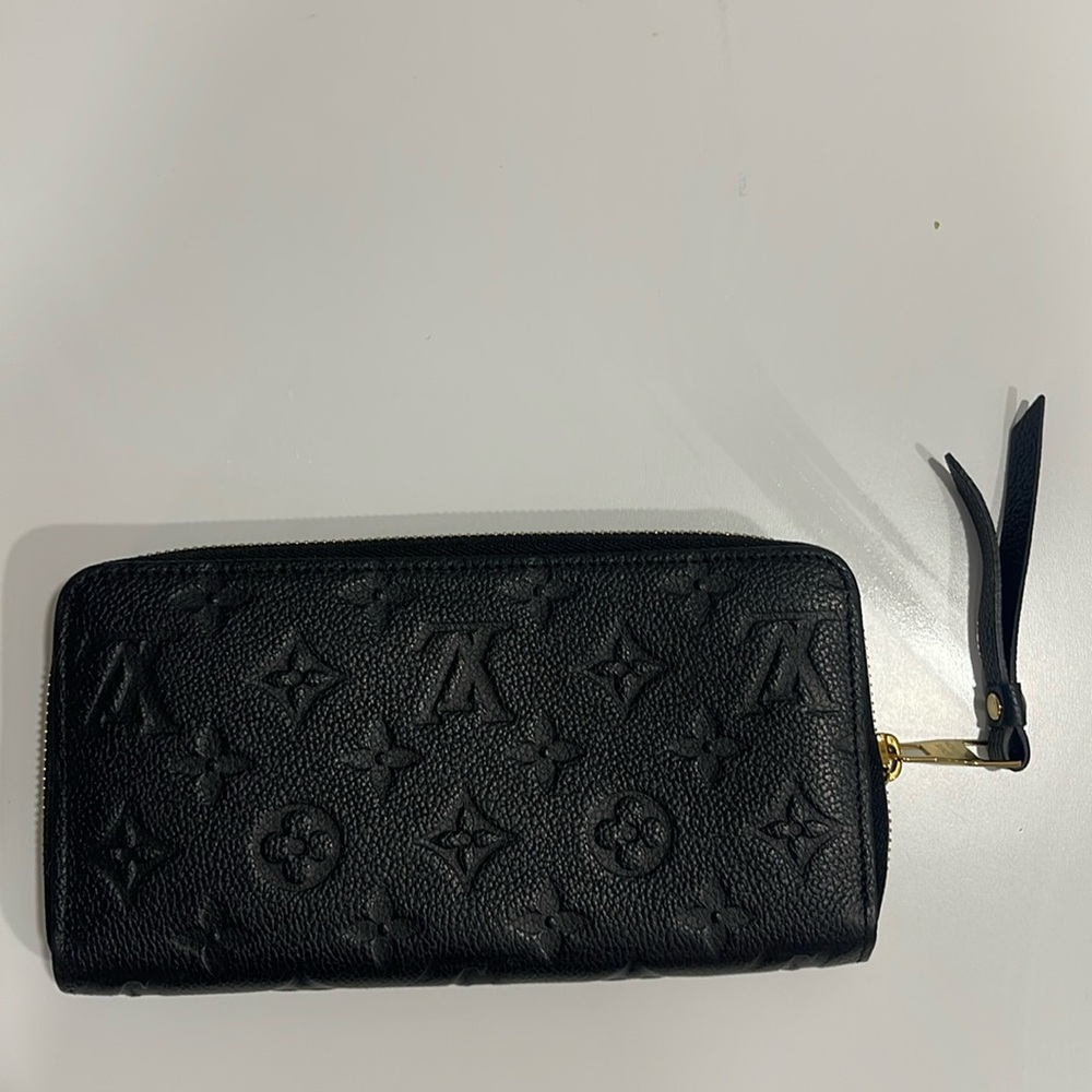 Louis Vuitton black monogram wallet zippy